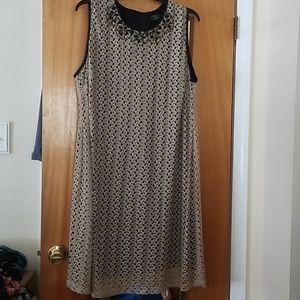 Sleveless dress worn once for a wedding.